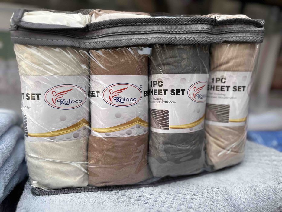 Однотонні трикотажні набори простинь повністю на резинці, фірми Koloco