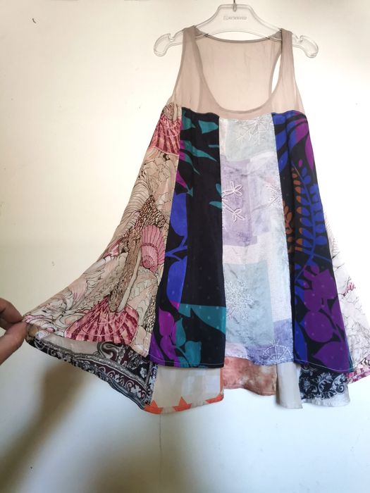 Jedwabna bluzka boho patchwork – rozmiar 4
Materiał:  jedwab

Zjawis