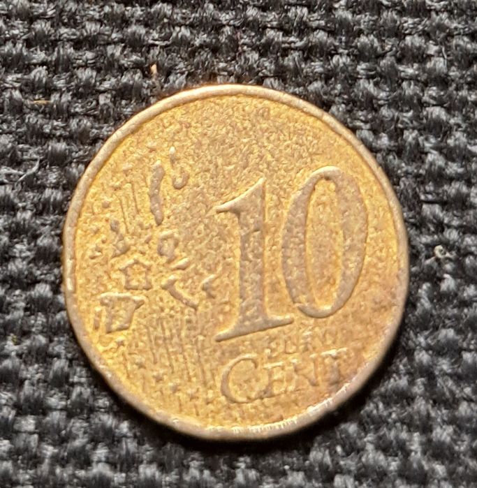 Moeda 10 centimos 2002 rara.