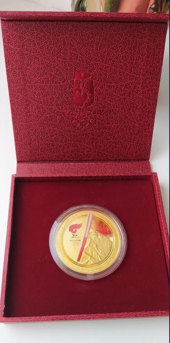 Настільна медаль 2008 року  . В честь запалення Олімпійського вогню.