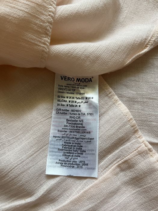 Віддам жіночу рожеву блузку