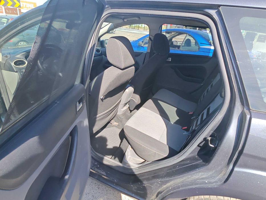 Ford Focus SW 1.6 TDCi Ghia — photo 5