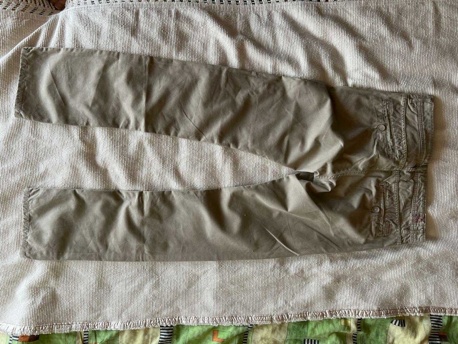 Spodnie jeansy męskie beżowe bawełniane logowane- M/L- Tommy Hilfiger.