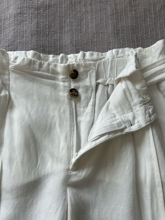 Białe lniane długie spodnie z wysokim stanem C&A 42