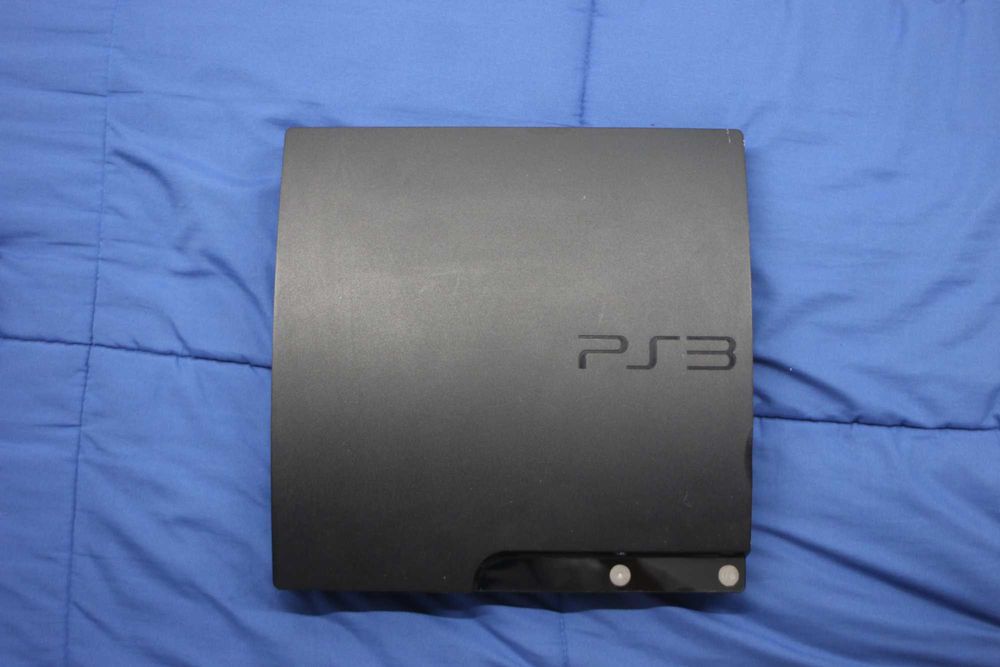 PlayStation 3 + Controllers + Power Cable + Controller Charger64729497874049121