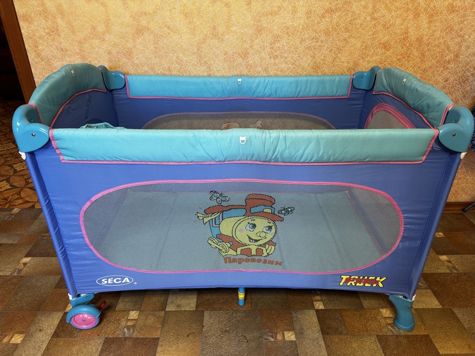 Продам манеж-кроватку Seca б/у
