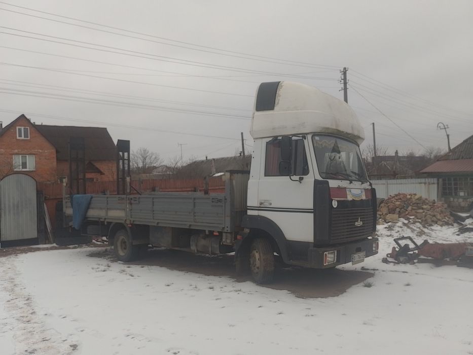 МАЗ бортовий евакуатор