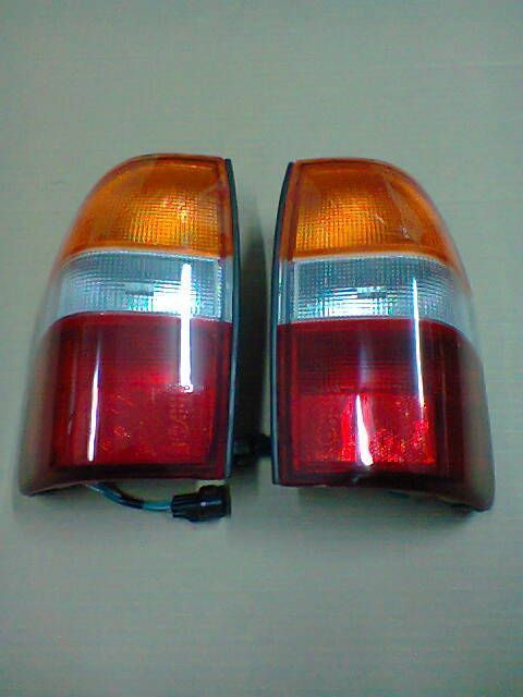Farolim / Farolins stop Mitsubishi L200 k74 k64 Strakar ( novos )
