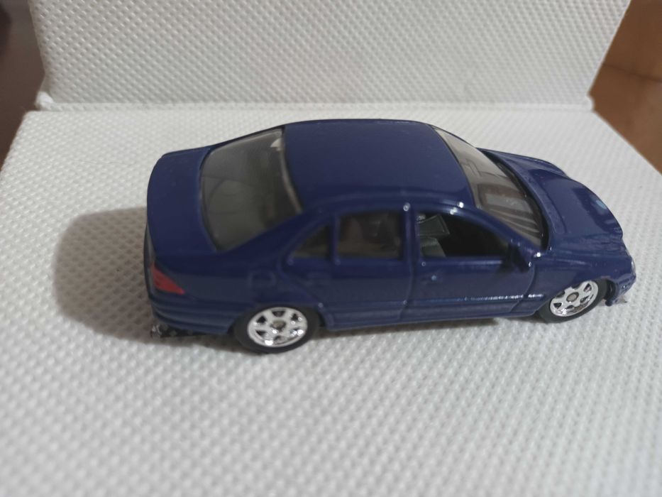 Miniaturas 1/64 Welly P2