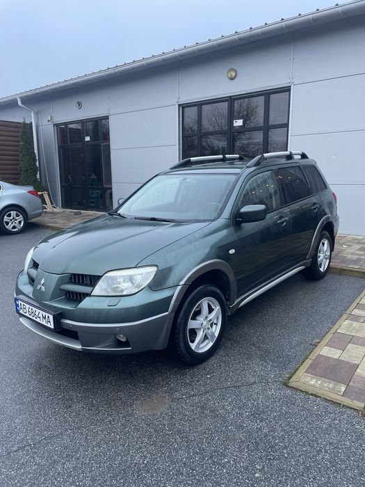 Аутдендер 2007р. 2.4 бензин автомат. 4х4. Тимчасовий облік 4199$