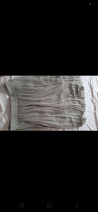 Casaco azul assimétrico