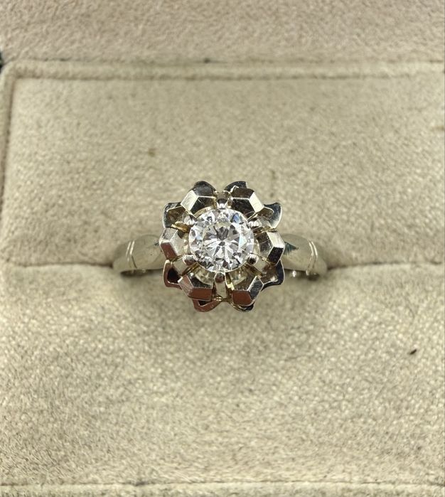 Złoty pierścionek 585 z diamentem 0,26ct Si1/J