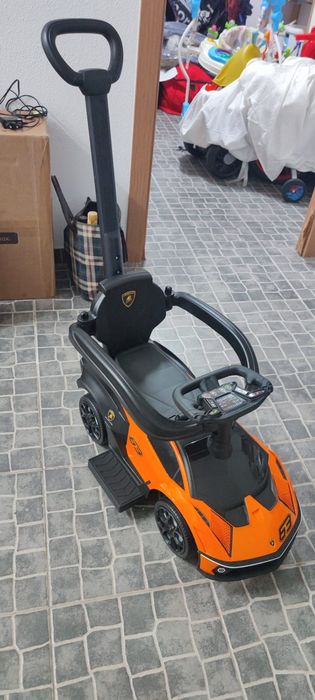 Carro bebé Lamborghini laranja impecável