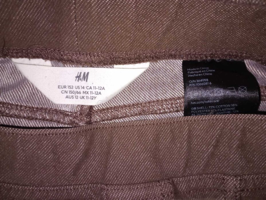 Spodnie H&M brązowe z rozcięciami roz 32 bdb