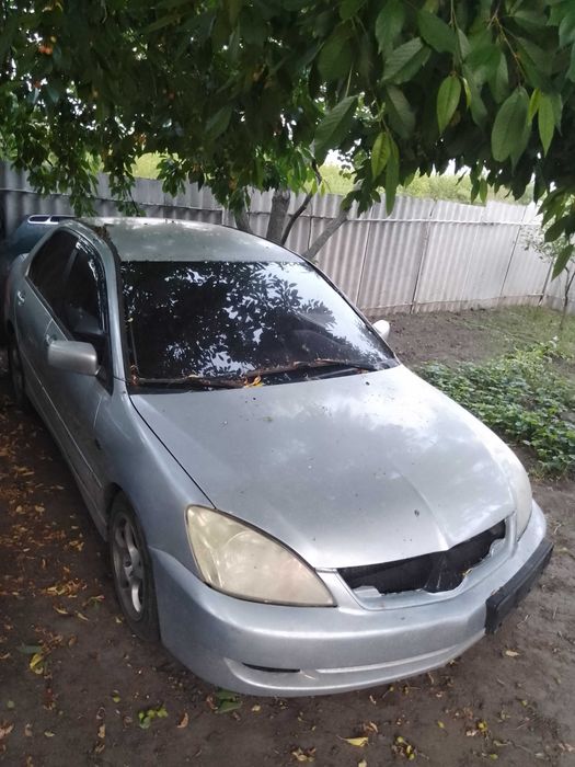 Розбираю мітсубісі лансер 9