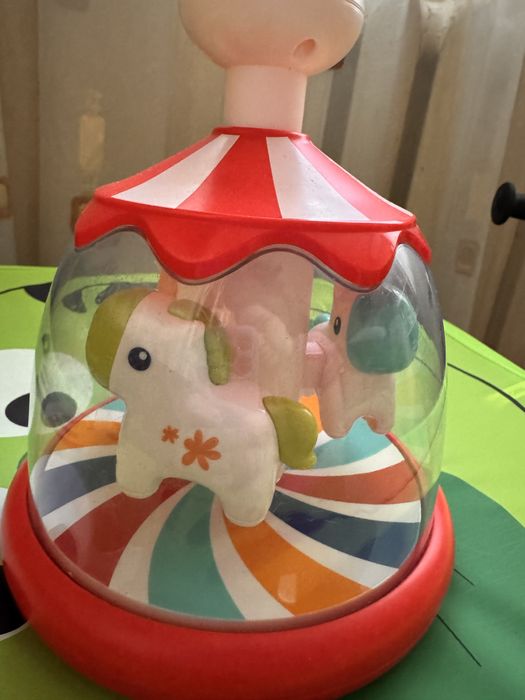 Дзига іграшка коники на каруселі