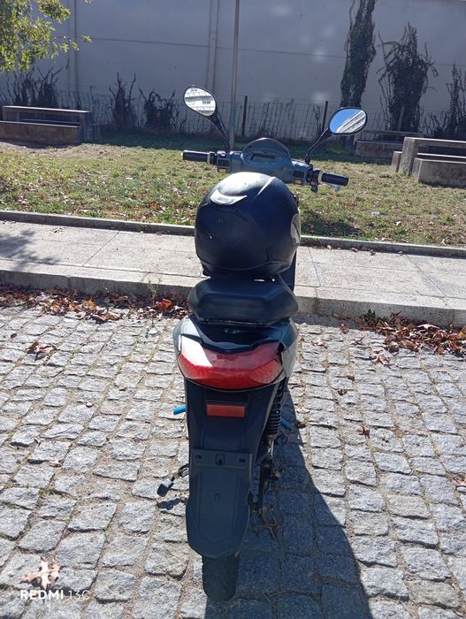 Mota elétrica bateria semi nova