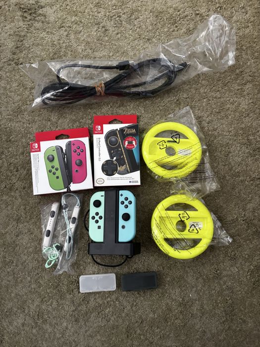 Nintendo Switch + Joy cons Extra + Dock Extra + Varios Acessorios Extra