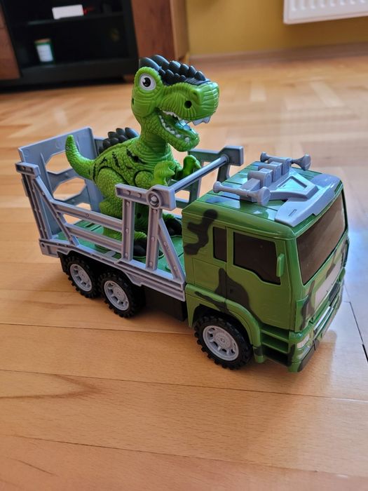 Zabawka dinozaur i auto