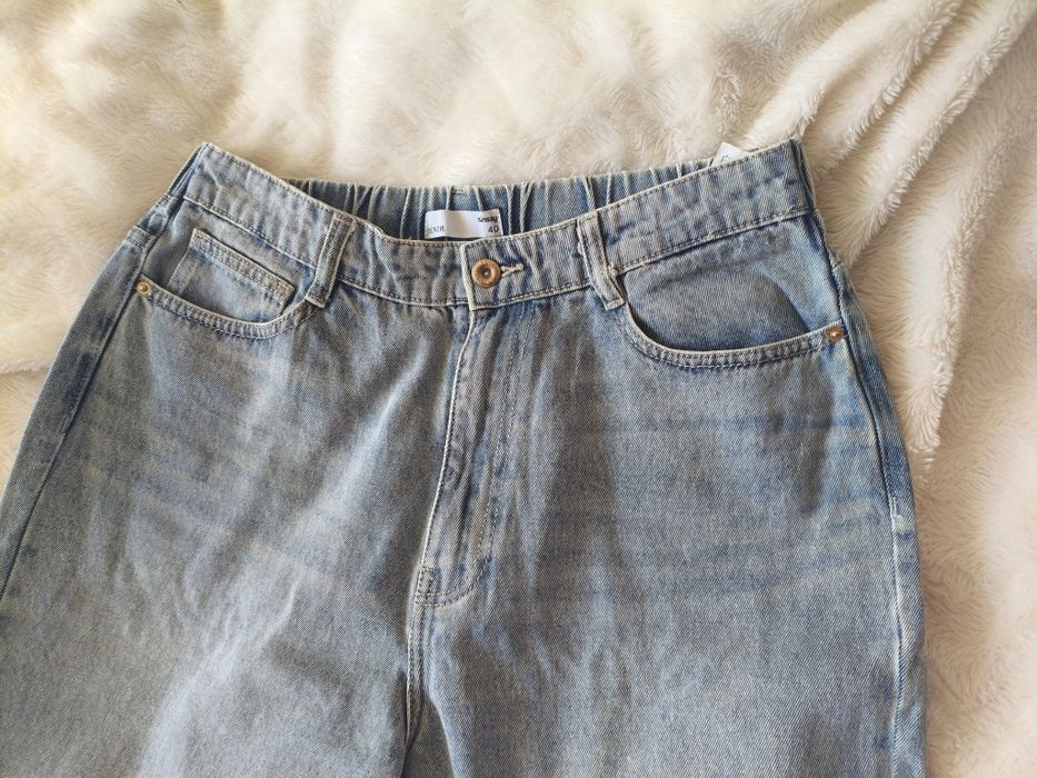 Spodnie jeansy nowe bez metki Sinsay M/L.