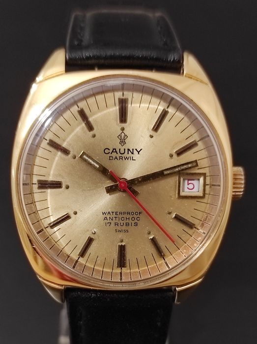 Cauny Darwil de homem, de corda manual, como novo, anos 70.