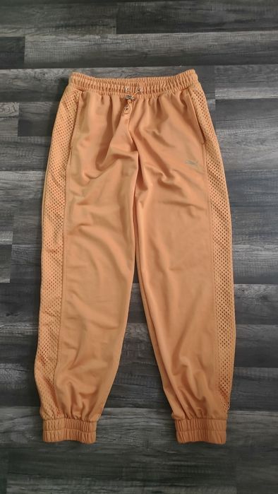 świetne deesowe spodnie PUMA