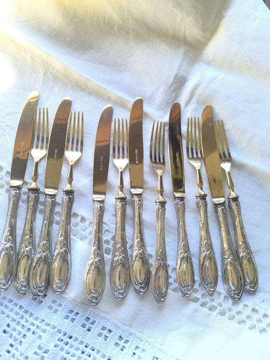 12 Talheres de sobremesa Solingen com cabo em prata