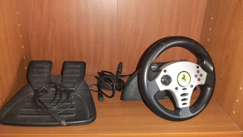 Consola Sony PlayStation 2 Slim Preta (SEM COMANDOS) + Volante Ferrari + Memory Card 64MB + pack de 23 jogos