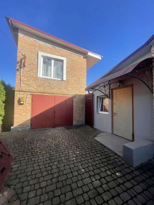 Частина будинку з житловою добудовою та гаражем - Вид 3