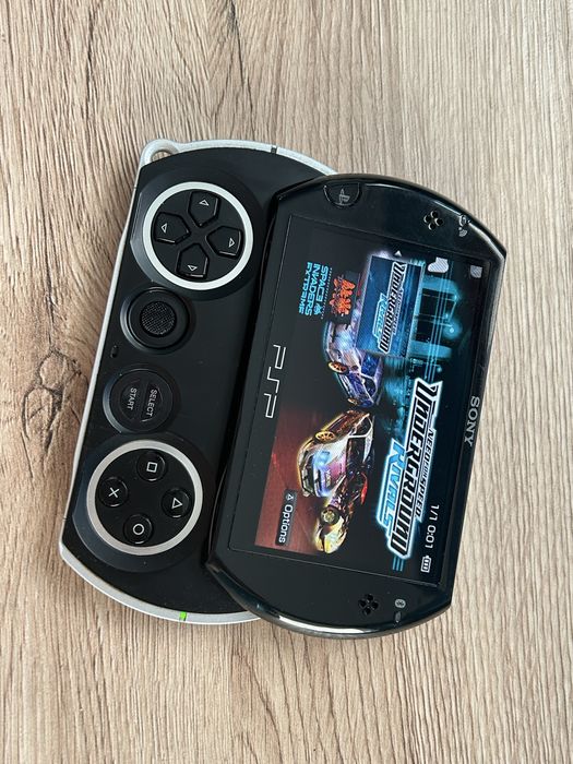 Konsola Sony PSP PlayStation Go Wysuwana Bardzo Dobry Stan W Pelni Sprawna 16gb Ładowarka