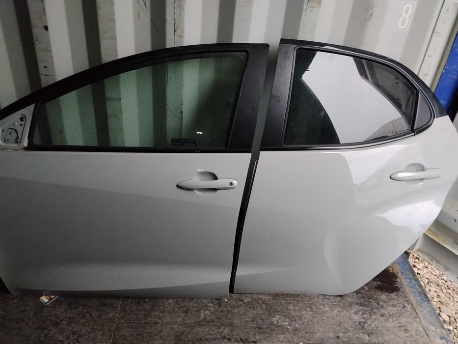 Drzwi Toyota Corolla e21  kolor 1k6