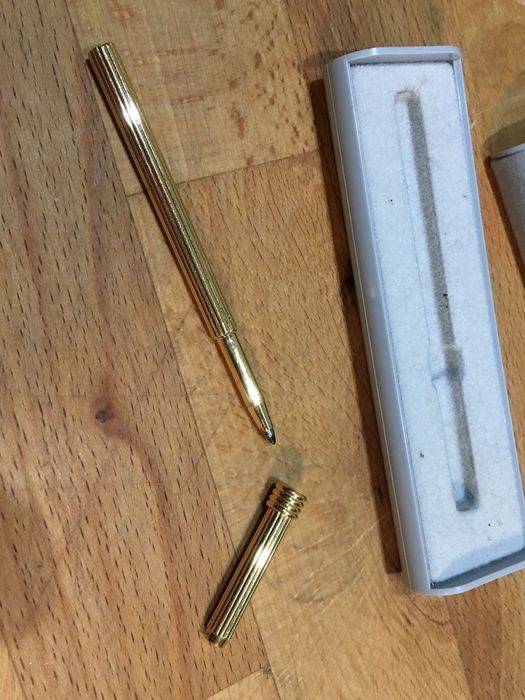 Caneta da Christian Dior com estojo.