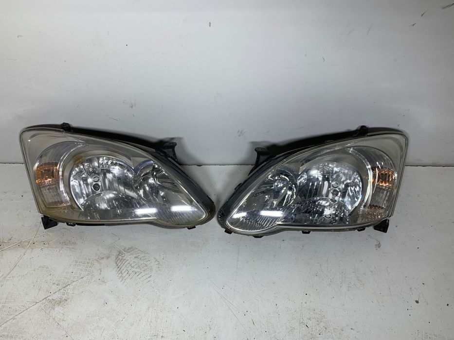 Prawy Lewy reflektor lampa EUROPA lampy przód toyota corolla E12 2006r