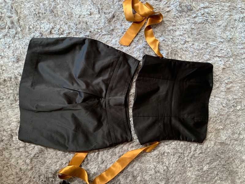 Conjunto Top e mini-saia em cetim preto com laço dourado de festa