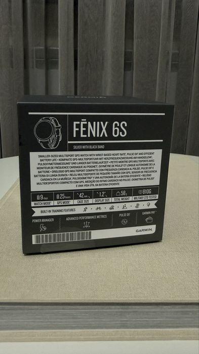 Смарт-годинник Garmin Fenix 6S сріблястий з чорним ремінцем
