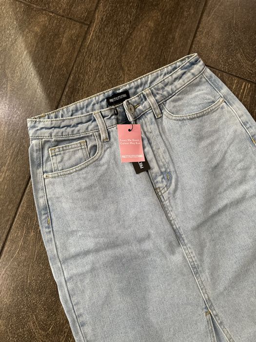 Джинсова спідниця міді