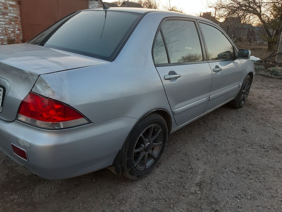 Мітцубісі Ланцер  9 з газом 4.