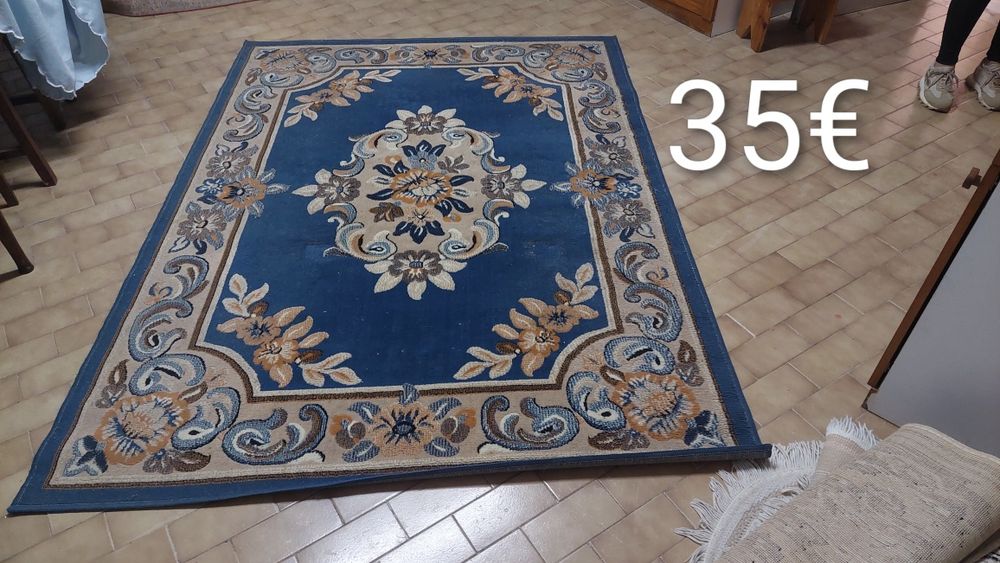 Carpetes / mantas / edredões