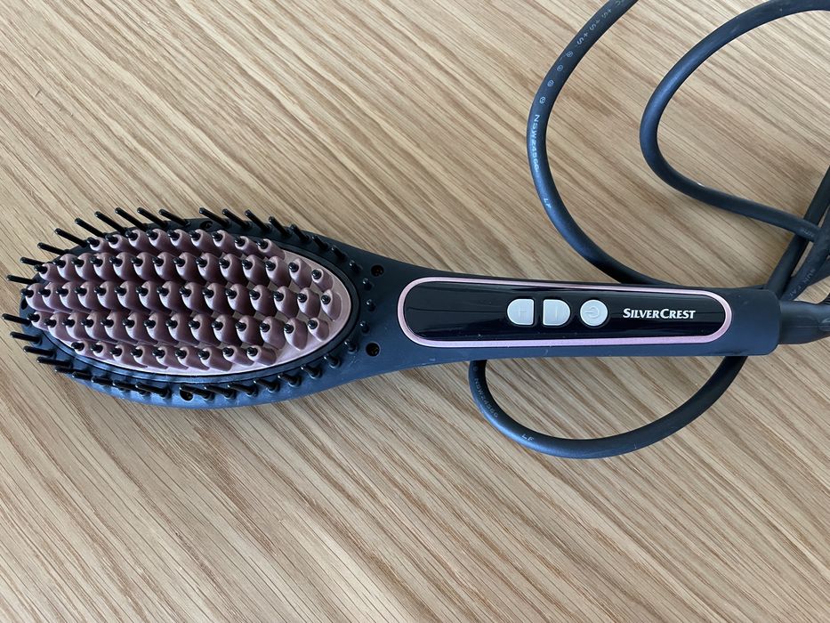 Escova de cabelo elétrica