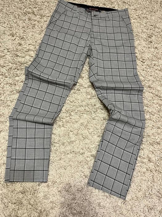 Класичні штани сірі в клітку