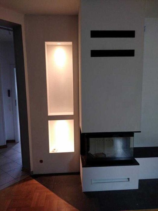 nowoczesny kominek narożny kompleksowy montaż SERWIS wymiana 10 lat gw