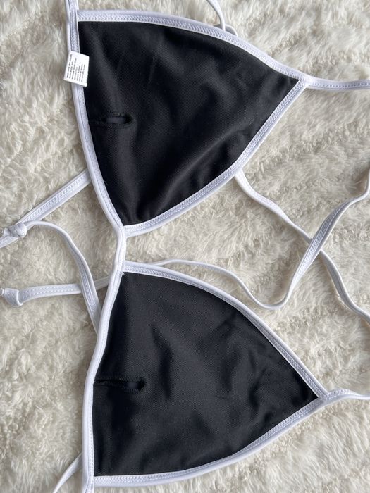 купальник черный и розовый с белой оконтовкой