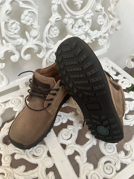 Botas em pele castsnhas