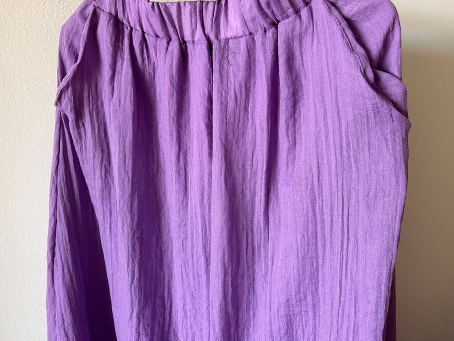 Saia comprida com bolsos