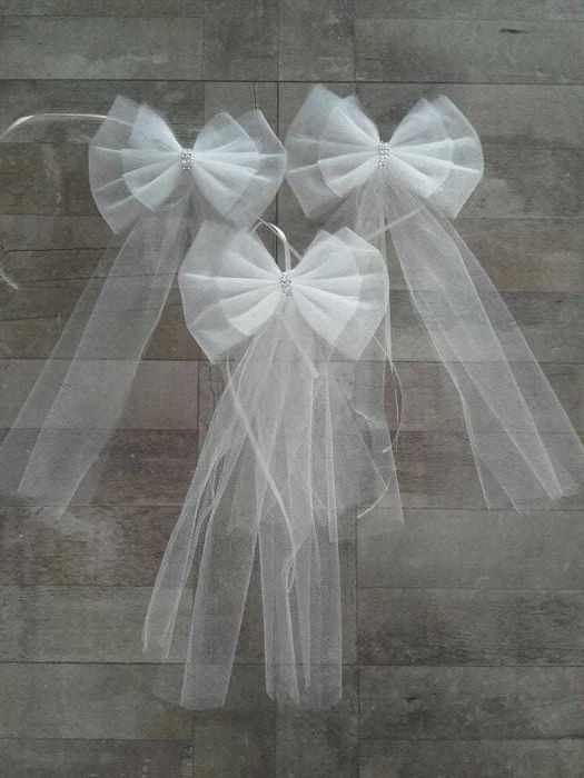 4 kokardy na klamki samochodu