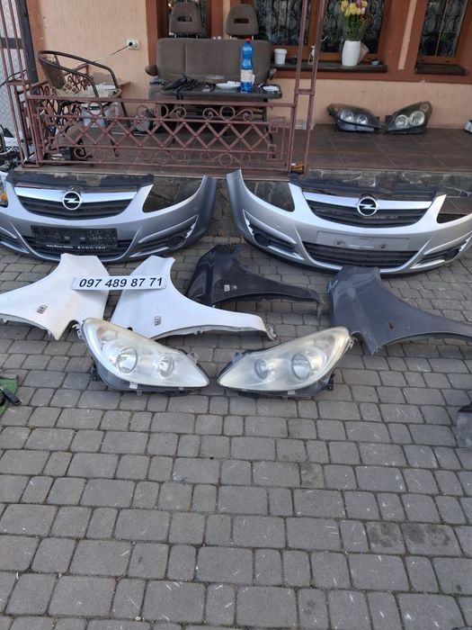 бампери Opel Corsa D,крила,стопи,ляда ,телевізор,підсилювач,радіатори