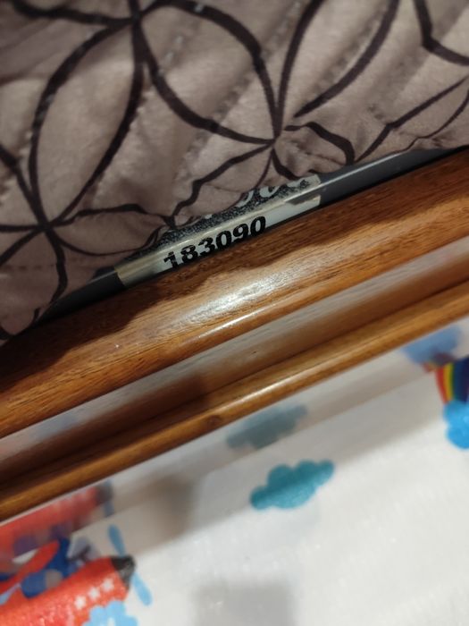 Cama em madeira de castanho