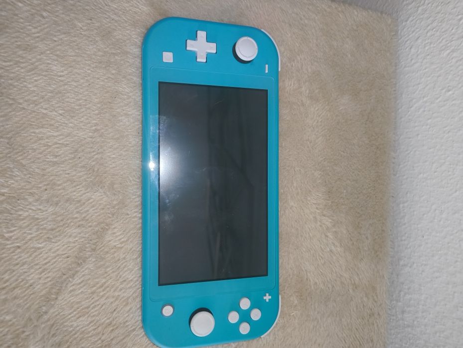 Nintendo Switch lite como nova