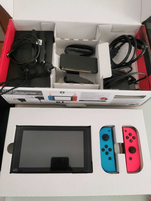 Nintendo Switch completa na caixa com 2 Jogos