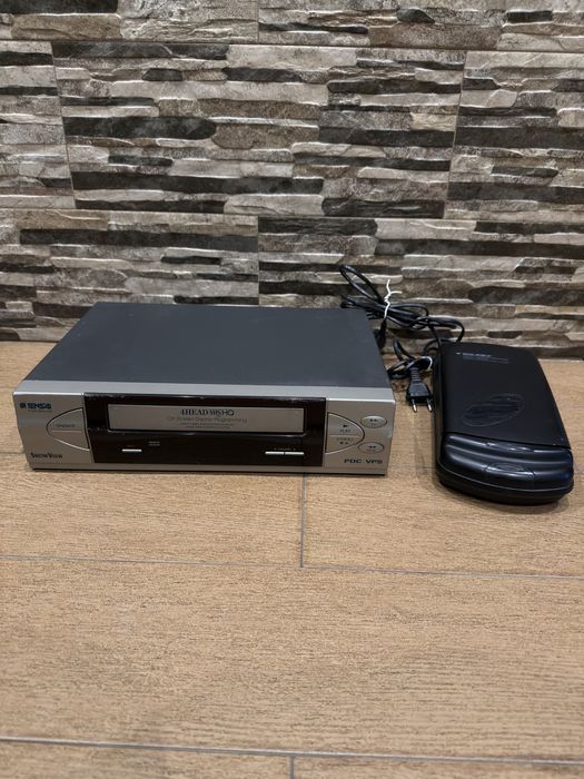 Leitor/Gravador e rebobinador de video cassetes